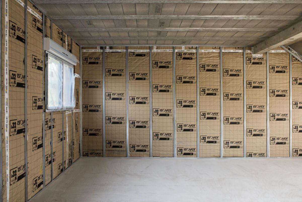 ITI isolation thermique intérieure Isover plaque plâtre doublage mur intérieur laine verre maison Lyon rénovation énergétique entreprise RGE MG1 Bati Concept Rhône Villeurbanne Bron devis gratuit